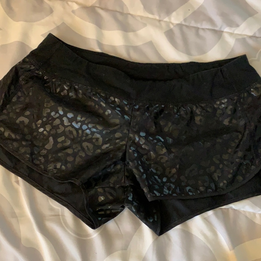 Pink black leopard print running shorts